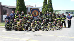 Junior firefighters and Explorers from the Fahrenheit 516! program pose for a group photo after a week of training, education and relationship building.