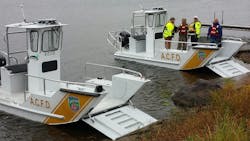 Lake Assault Boats is displaying two vessels at booth #9214 at FDIC in Indianapolis. On view will be Lake Assault’s nimble 21-foot rescue (foreground) boat and a 28-foot fireboat that is capable of pumping 1500 gpm. Lake Assault Boats is displaying two vessels at booth #9214 at FDIC in Indianapolis. On view will be Lake Assault’s nimble 21-foot rescue (foreground) boat and a 28-foot fireboat that is capable of pumping 1500 gpm.