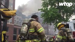 Firefighters work to contain a five-alarm fire at a construction site in College Park, MD. Firefighters work to contain a five-alarm fire at a construction site in College Park, MD.