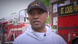 St. Louis Fire Capt. Leon Whitener speaks to KSDK-TV after teaming with a nearby resident to rescue a woman from a burning home.