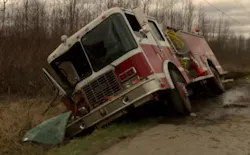 A fire truck sits in a ditch after a crash that injured two Vermont firefighters. A fire truck sits in a ditch after a crash that injured two Vermont firefighters.