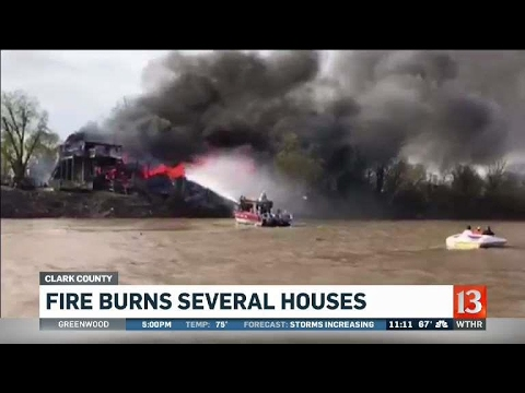 IN Firefighters Use Boat to Battle Blaze