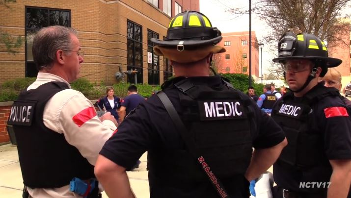 First responders stand outside Edward Hospital in Naperville, IL, following an active shooter drill.