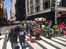 FDNY emergency crews are on the scene after a car crashed into pedestrians in Times Square on Thursday, killing one and injuring a dozen others. FDNY emergency crews are on the scene after a car crashed into pedestrians in Times Square on Thursday, killing one and injuring a dozen others.