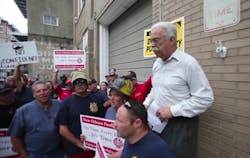 New Orleans Firefighters Association President Nick Felton, right, speaks out against Fire Chief Tim McConnell on Saturday.