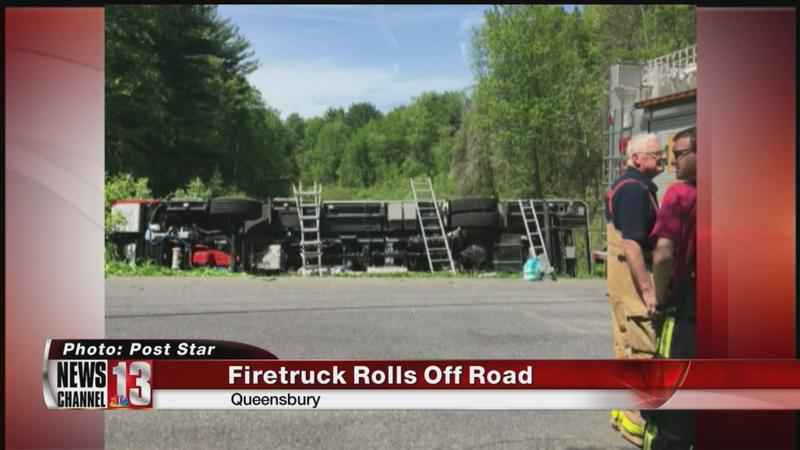 Four Bay Ridge volunteer firefighters suffered minor injuries Sunday when their apparatus rolled off a road and overturned into a ditch.