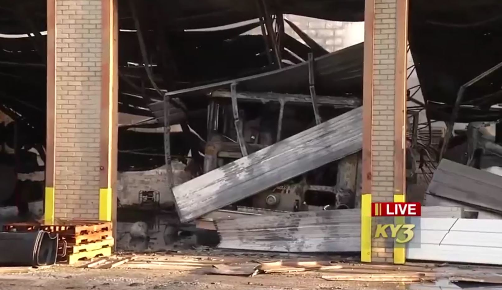 A charred fire apparatus can be seen inside the remains of the Gainesville fire station after it was destroyed by fire early Tuesday morning.