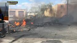 Two people were killed when a small plane headed for Teterboro Airport crashed in an industrial area of Carlstadt, NJ.