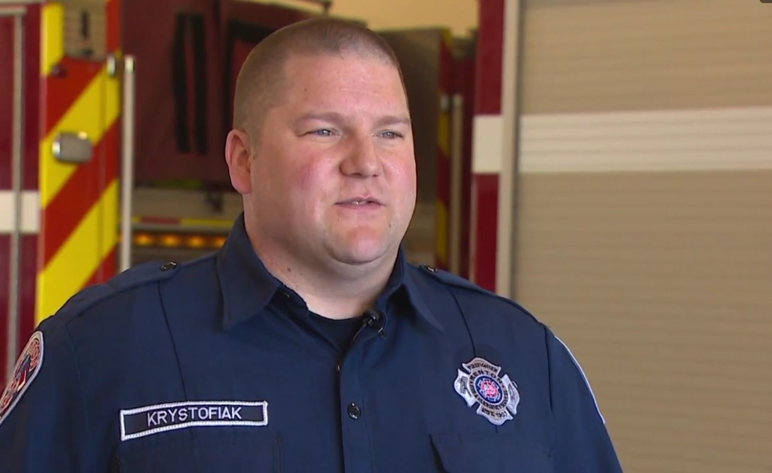 Renton firefighter/EMT Chris Krystofiak was aboard a flight Friday night when he and other first responders helped an unconscious man in need of medical aid.