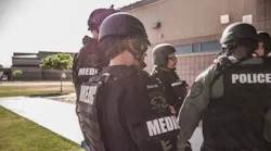 Gilbert, AZ, firefighters participate in an active shooter training scenario in a local high school.
