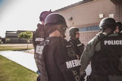 Gilbert, AZ, firefighters participate in an active shooter training scenario in a local high school. Gilbert, AZ, firefighters participate in an active shooter training scenario in a local high school.