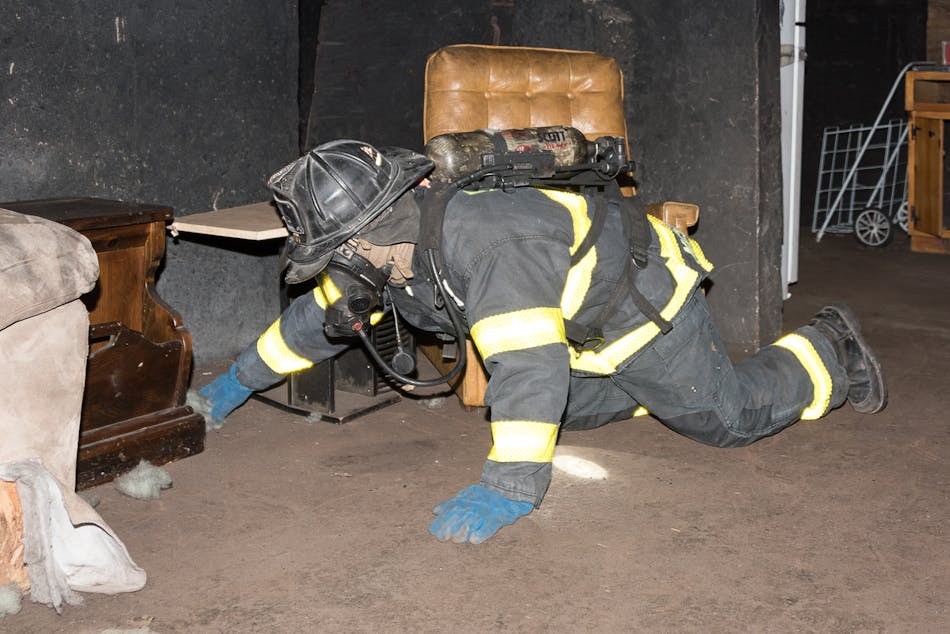 Firefighters should search on their hands and knees. This keeps their hips and shoulders orientated in the direction of travel.