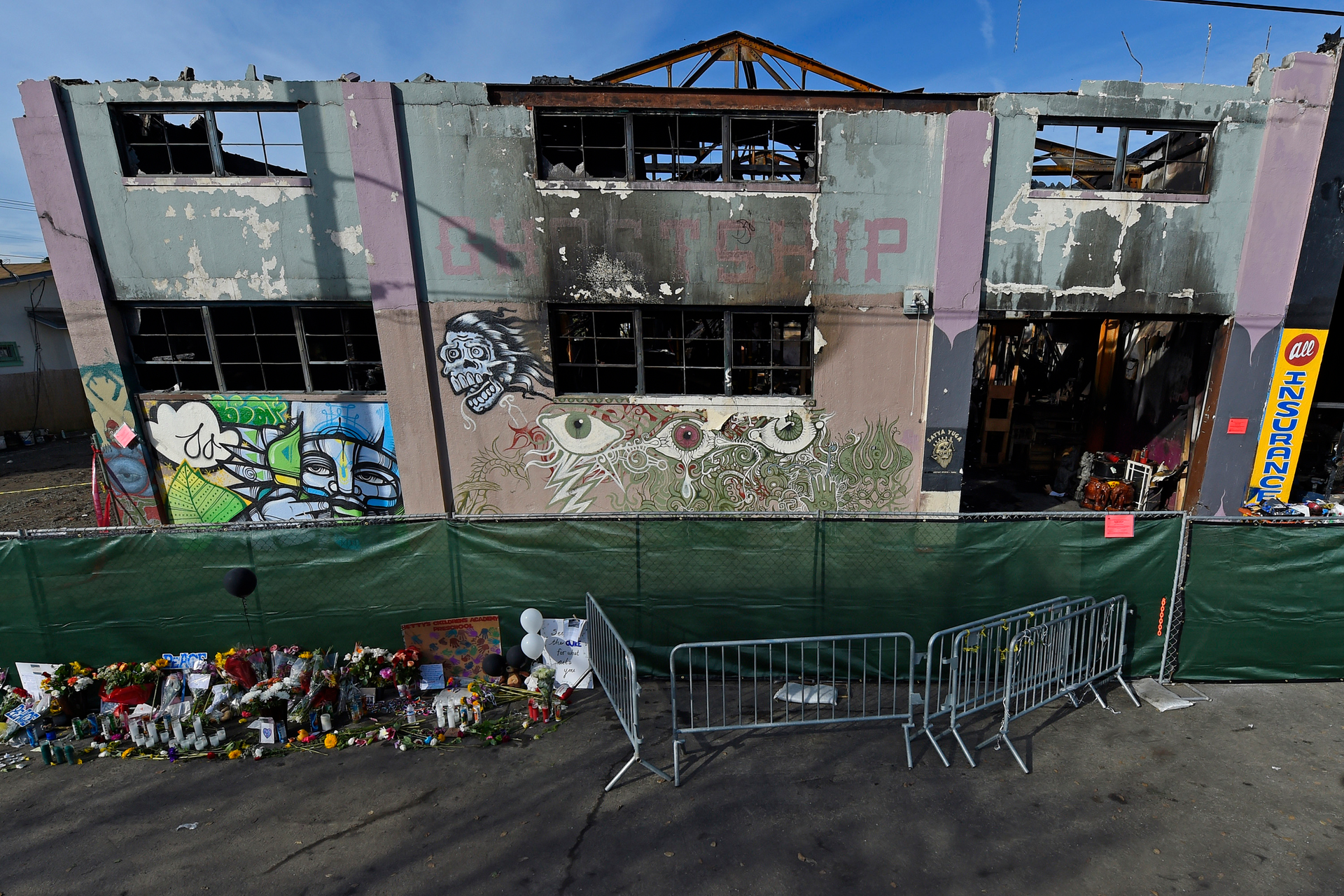 View of the outside of the scorched Ghost Ship warehouse building in Oakland, Calif. on Monday, Dec. 12, 2016. The Dec. 2 fire tore through the two-story building on the 1300 block of 31st Avenue killing 36 people.