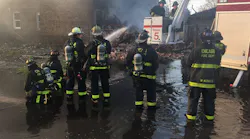 Thirty-two members of the Chicago Fire Department's brass resigned their positions and returned to the rank-and-file amid an ongoing pay and benefit dispute.