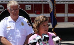 Syracuse Mayor Stephanie Miner speaks at a press conference Wednesday flanked by fire chief Paul Linnertz, who was censured in a vote a day earlier by the New York State Professional Fire Fighters Association.