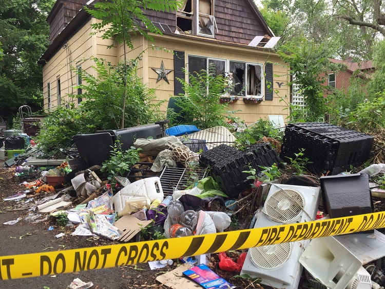 A Westfield, MA, home that fire officials described as a 'hoarding situation' caught fire Saturday, leading to the deaths of two people.
