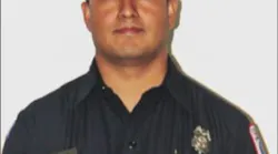 Roswell firefighter Carlos Garcia was off-duty when he helped rescue two men trapped in a burning truck.