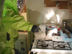 Emergency responders investigating a suspected fentanyl crime scene. Emergency responders investigating a suspected fentanyl crime scene.