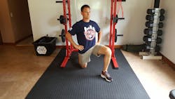 How to perform the Half-Kneeling Hip Flexor Stretch: Start with one knee down on the floor or a cushion with the other leg bent with the foot flat on the floor. Stay in an upright and tall position with your back straight. Next, squeeze the butt cheek (glute) of the knee that is down and try to push your hip forward. You should feel a stretch in the front of your hip and maybe even down your quad depending how tight you are. Breathe as you hold your hips in this position. You can reach your hands toward the ceiling to add more stretch but, be sure to keep your back straight and do not arch. Hold the stretch for 20–30 seconds for 3x on each side. How to perform the Half-Kneeling Hip Flexor Stretch: Start with one knee down on the floor or a cushion with the other leg bent with the foot flat on the floor. Stay in an upright and tall position with your back straight. Next, squeeze the butt cheek (glute) of the knee that is down and try to push your hip forward. You should feel a stretch in the front of your hip and maybe even down your quad depending how tight you are. Breathe as you hold your hips in this position. You can reach your hands toward the ceiling to add more stretch but, be sure to keep your back straight and do not arch. Hold the stretch for 20–30 seconds for 3x on each side.