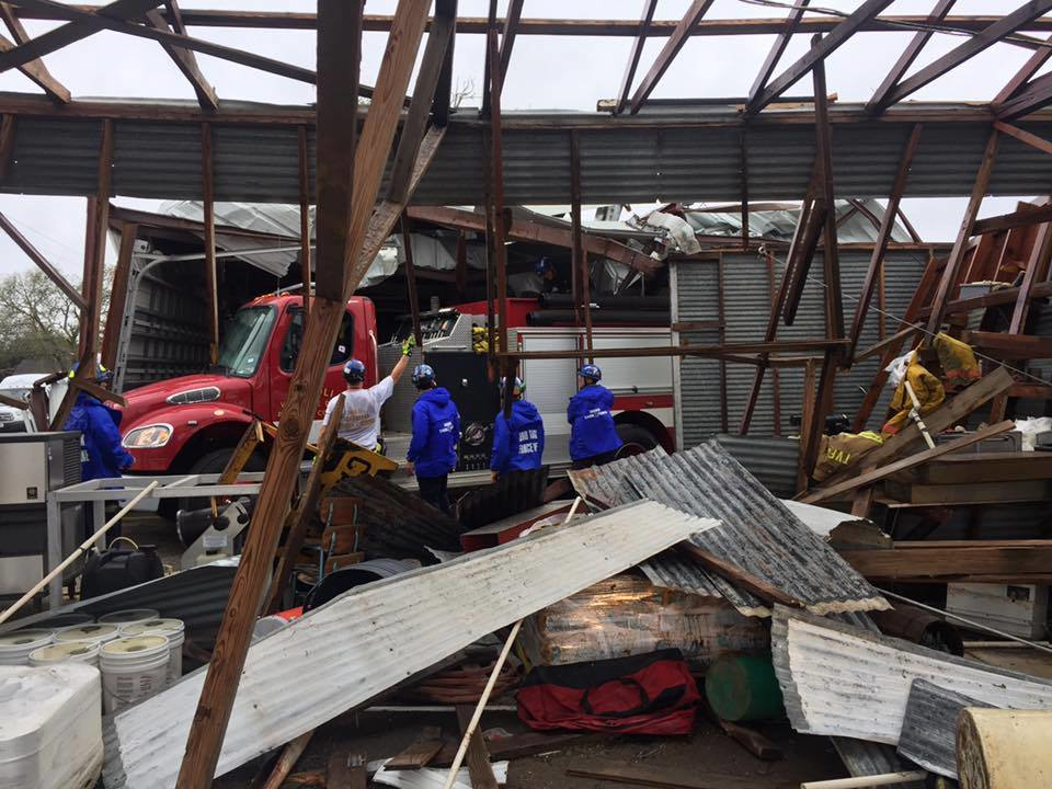 Members of OH-TF 1 helped Tivoli firefighters remove their pumper from the collapsed fire station.