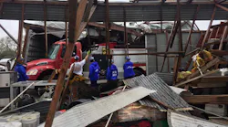 Members of OH-TF 1 helped Tivoli firefighters remove their pumper from the collapsed fire station.