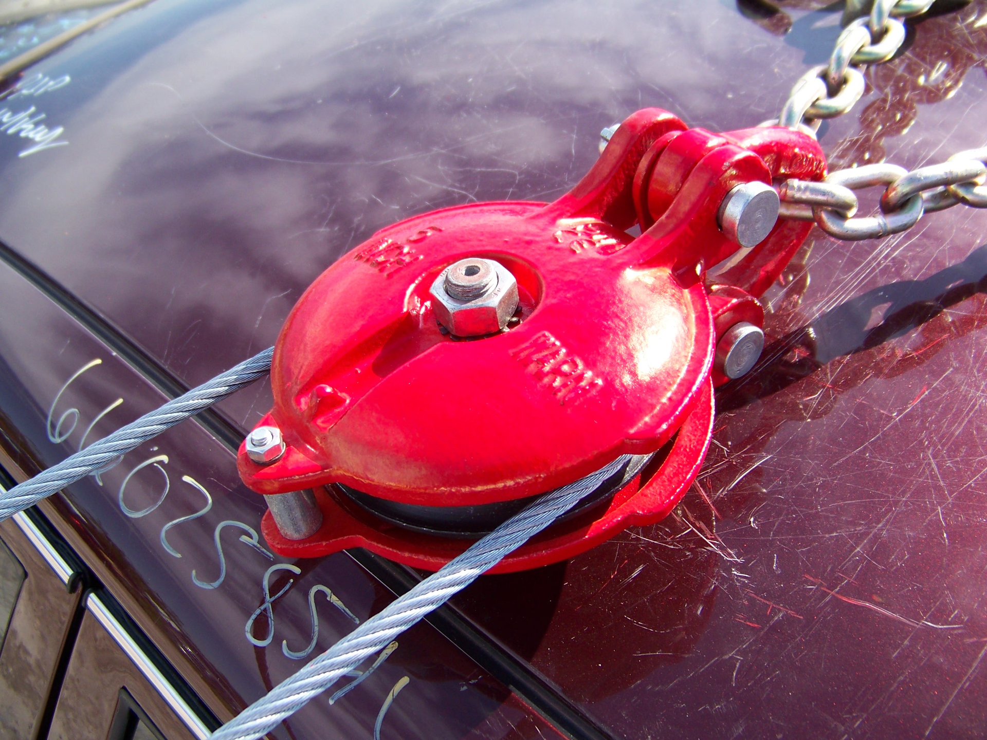 This snatch block has an ultimate strength rating of 36,000 pounds. With a 4:1 safety factor, the Working Load Limit is 9,000 pounds. It has a 5-inch diameter sheave and works with up to a half-inch diameter wire rope. Rescue personnel should be able to explain specifications such as this for the snatch block used within their rescue inventory. Photos by Ron Moore