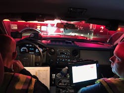 Chief JJ and I inside the command vehicle. Notice the look on his face. He is mentoring me and focused on every word I say to ensure I do the job correctly.