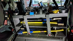 The rear crew area on College Park, MD, Truck 12 carries two sets of irons, a Hydra Ram and other equipment. The rear crew area on College Park, MD, Truck 12 carries two sets of irons, a Hydra Ram and other equipment.