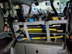 The rear crew area on College Park, MD, Truck 12 carries two sets of irons, a Hydra Ram and other equipment. The rear crew area on College Park, MD, Truck 12 carries two sets of irons, a Hydra Ram and other equipment.