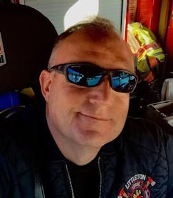 Littleton firefighter Scott Holt. Littleton firefighter Scott Holt.