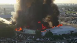 Firefighters spent hours tackling this large fire at a textile warehouse in the Fairfield area of South Baltimore on Monday morning.