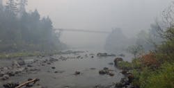 A smoky haze hovers in Oregon's Illinois River Valley as efforts to contain the massive Chetco Bar Fire continue. A smoky haze hovers in Oregon's Illinois River Valley as efforts to contain the massive Chetco Bar Fire continue.