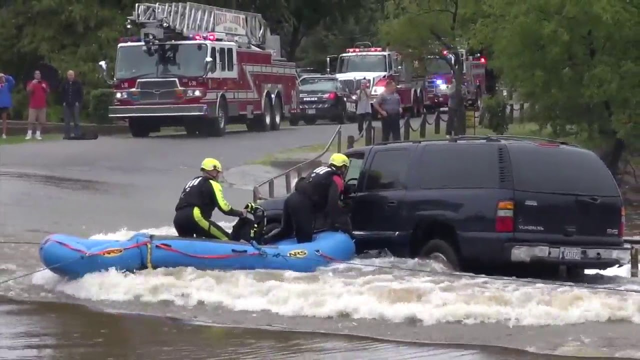Watch OK Firefighters Rescue Person from Flooded Vehicle