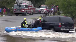 Watch OK Firefighters Rescue Person from Flooded Vehicle