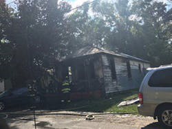 Petersburg firefighters remain on scene Sunday after making quick work of a &apos;suspicious&apos; fire at a small vacant home.
