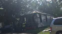 Petersburg firefighters remain on scene Sunday after making quick work of a 'suspicious' fire at a small vacant home.