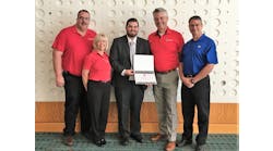 Oklahoma State University student Brett Seggerman (center) received the 2017 Phillip L. Turner Fire Protection Scholarship at Firehouse Expo in Nashville. Seggerman is pictured here with Akron Brass Senior District Manager Kent Clasen (left to right), Akron Brass Director of Marketing Kim Morrow, FAMA Board Vice President Steve Toren and FAMA 2017 Education Committee Chair Lou Milanovich.