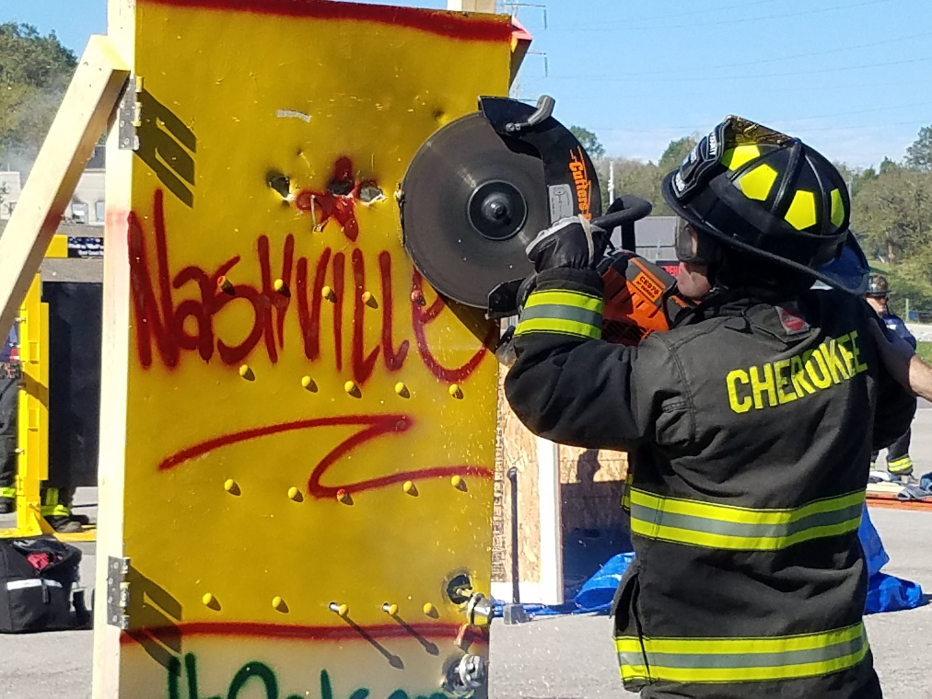 A firefighter works on urban forcible entry at the Nashville Fire Academy on Wednesday, Oct. 18, 2017.