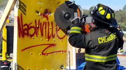 A firefighter works on urban forcible entry at the Nashville Fire Academy on Wednesday, Oct. 18, 2017.