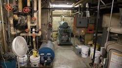 When the door to the mechanical room was opened, there was a light haze inside, and firefighters reported hearing a hissing noise that seemed to be coming from a green cylinder. Upon entering the room, the four firefighters began to feel lightheaded. When the door to the mechanical room was opened, there was a light haze inside, and firefighters reported hearing a hissing noise that seemed to be coming from a green cylinder. Upon entering the room, the four firefighters began to feel lightheaded.