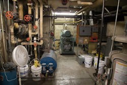 When the door to the mechanical room was opened, there was a light haze inside, and firefighters reported hearing a hissing noise that seemed to be coming from a green cylinder. Upon entering the room, the four firefighters began to feel lightheaded. When the door to the mechanical room was opened, there was a light haze inside, and firefighters reported hearing a hissing noise that seemed to be coming from a green cylinder. Upon entering the room, the four firefighters began to feel lightheaded.