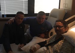 Los Angeles City firefighter Frank Lima, left, tweeted this photo after visiting an unidentified San Bernardino County firefighter who was shot in the arm in Las Vegas on Sunday night while rendering CPR.