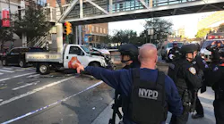 The NYPD's Counterterrorism Unit was on scene after an alleged terrorist drove the rented pickup truck seen in the background along a bike path in lower Manhattan on Tuesday, killing eight people.