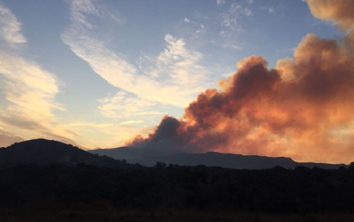 Smoke rises from the Canyon Fire near Corona, CA, on Sept. 26, 2017.