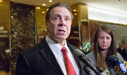 New York Gov. Andrew Cuomo speaks with reporters in the lobby of Trump Tower in New York City following a meeting with President Donald Trump on Jan. 18, 2017. New York Gov. Andrew Cuomo speaks with reporters in the lobby of Trump Tower in New York City following a meeting with President Donald Trump on Jan. 18, 2017.