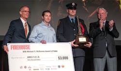 Firehouse Editor-in-Chief Tim Sendelbach (left) and Chief Michael O. McNamee (right) present a check to FDNY firefighter James P. Lee Jr., (second from right) the recipient of the 2016 Michael O. McNamee Award of Valor. Robert Daus, Jr. vice president of Liberty Art Works, also presented a custom medal to Lee.