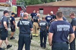 Henderson, KY, firefighters during a training session in July. Henderson, KY, firefighters during a training session in July.