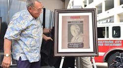 Alan Brunacini unveils his plaque during the Firehouse Hall of Fame induction ceremony at Firehouse Expo 2015.