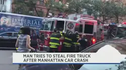 FDNY firefighters reach into the cab of a fire apparatus in Manhattan on Sunday after a man jumped inside and tried to steal the vehicle at the scene of a multiple-car collision.