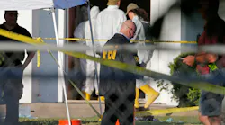 First responders work the scene of a shooting at the First Baptist Church of Sutherland Springs, Texas on Sunday, Nov. 5, 2017.